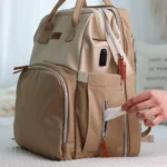 Zaino per pannolini con scomparto per salviette umidificate NAPPY Mocca Zaino per pannolini con scomparto per salviette umidificate NAPPY Mocca