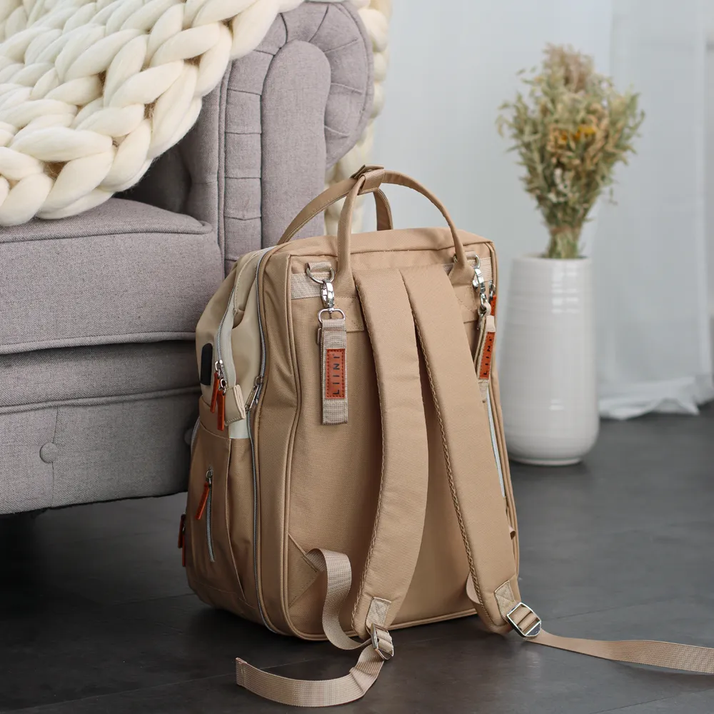 Borsa fasciatoio NAPPY Mocca in ecopelle con culla Borsa fasciatoio NAPPY Mocca in ecopelle con culla