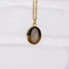 Collana con ancora e impronta digitale in oro