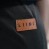 Porte-bébé LIINI noir patch en cuir Porte-bébé LIINI noir patch en cuir