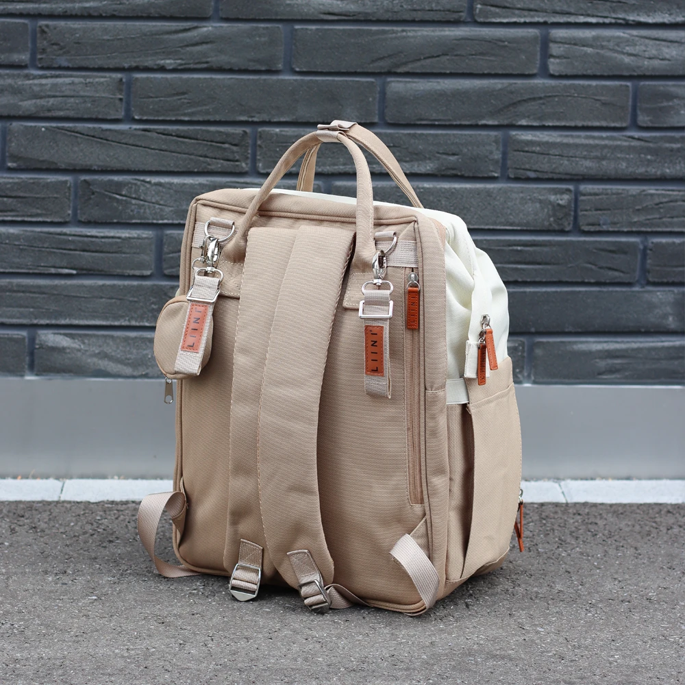 Wickelrucksack für unterwegs LIINI Wickeltasche beige Wickelrucksack für unterwegs LIINI Wickeltasche beige